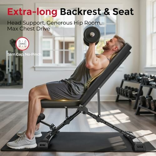 Man using adjustable weight bench in home gym.