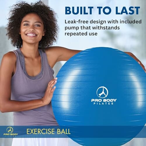 Smiling woman holding a Pro Body Pilates exercise ball with built to last text.