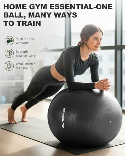 Woman exercising with a large fitness ball in a home gym setting.