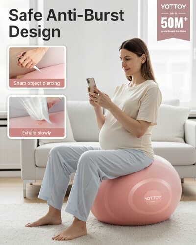 Pregnant woman sitting on a pink exercise ball, using a smartphone, highlighting safe anti-burst design features.