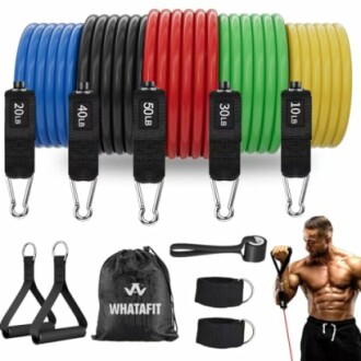 Set of colorful resistance bands with handles and accessories for fitness.