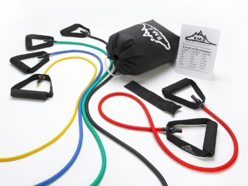 Set of colorful resistance bands with handles, a carrying bag, and an instruction sheet.
