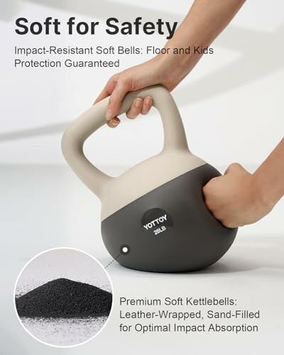 Soft kettlebell being held, highlighting impact-resistant features and sand filling.