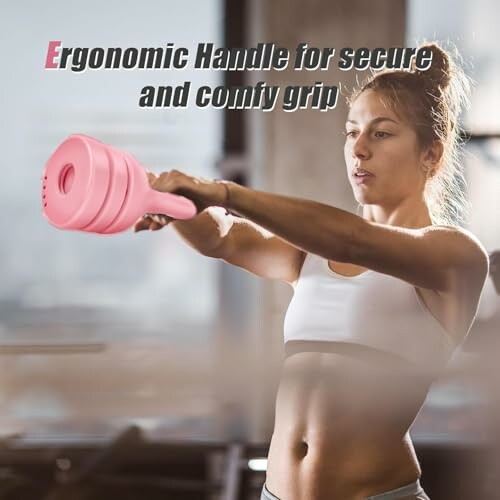 Woman exercising with pink dumbbell in gym